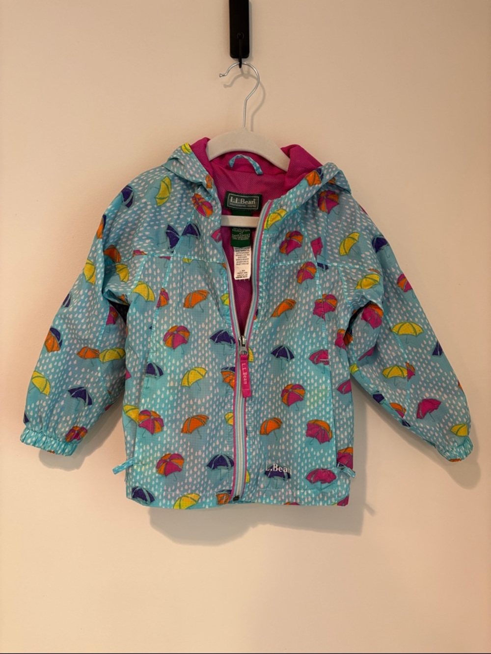 LL Bean 4T rain jacket multicolor umbrella print on light blue background
